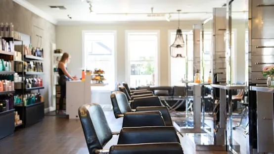 Inside Muse Boutique Salon in Arlington, VA — styling chairs and mirrors